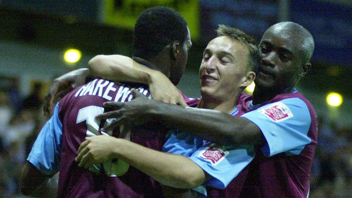 Mark Noble celebrates Marlon Harewood's second goal on his West Ham debut in August 2004