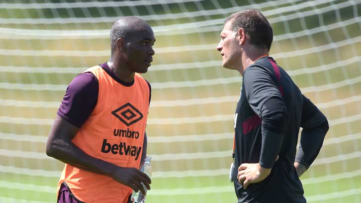 Angelo Ogbonna chats with Slaven Bilic