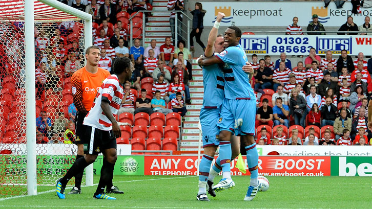 Kevin Nolan celebrates scoring against Doncaster