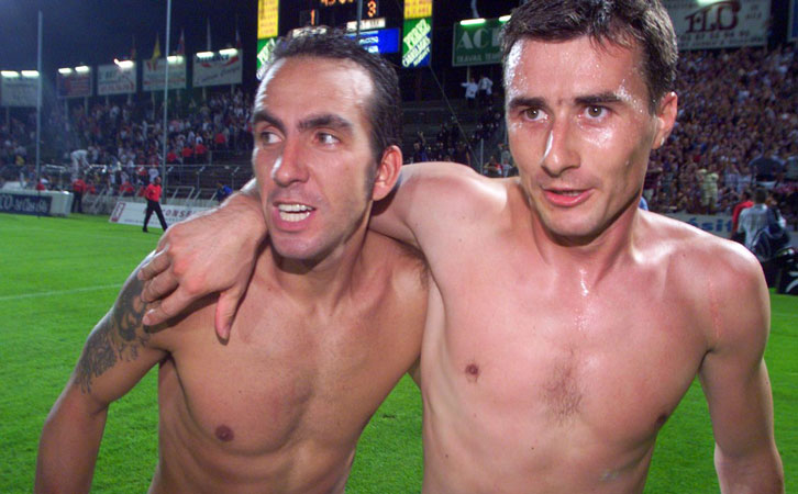 Paolo Di Canio and Marc Keller celebrate winning the Intertoto Cup in Metz
