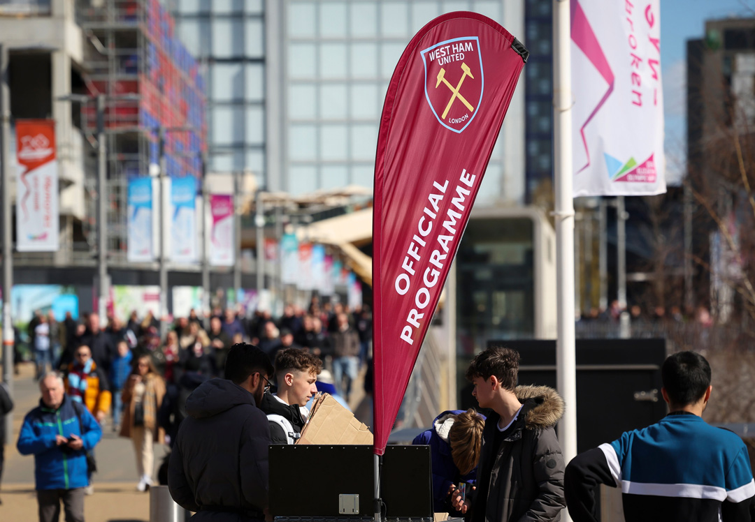 Programme seller outside London Stadium