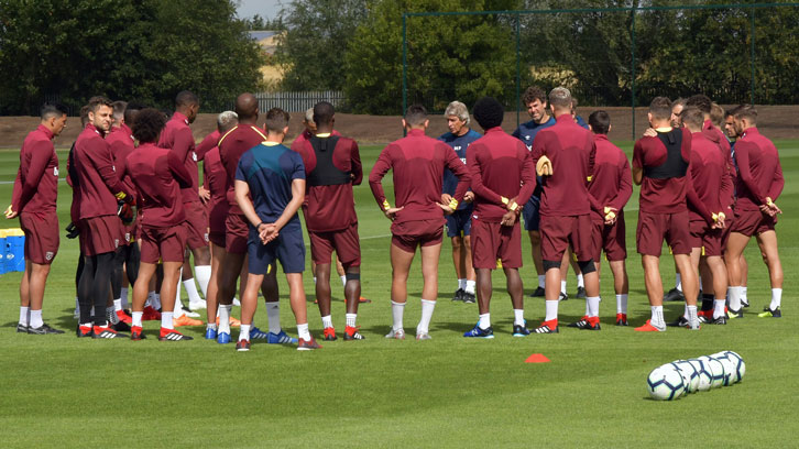 Manuel Pellegrini addresses his players at Rush Green