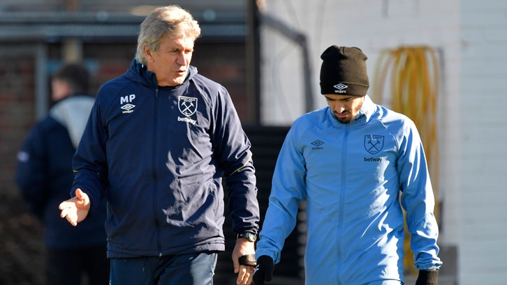 Manuel Pellegrini chats to Manuel Lanzini at Rush Green