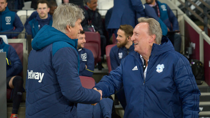 Manuel Pellegrini greets Cardiff City manager Neil Warnock at London Stadium