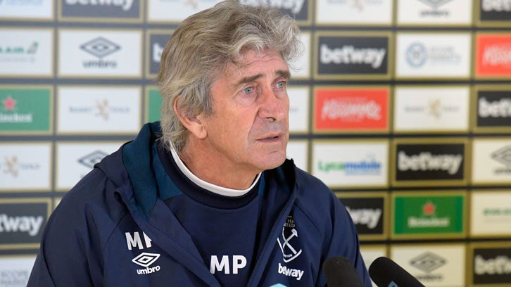 Manuel Pellegrini talks to the media at Rush Green