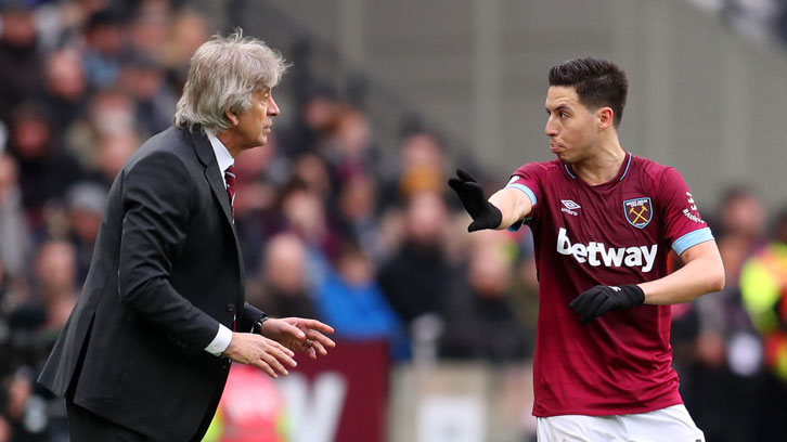 Manuel Pellegrini chats to Samir Nasri