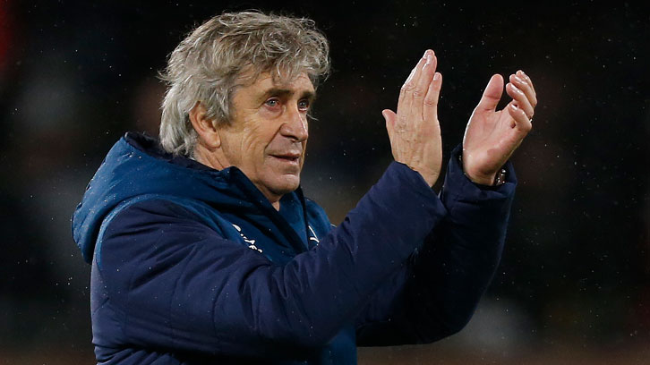 Manuel Pellegrini applauds the Claret and Blue Army at Craven Cottage
