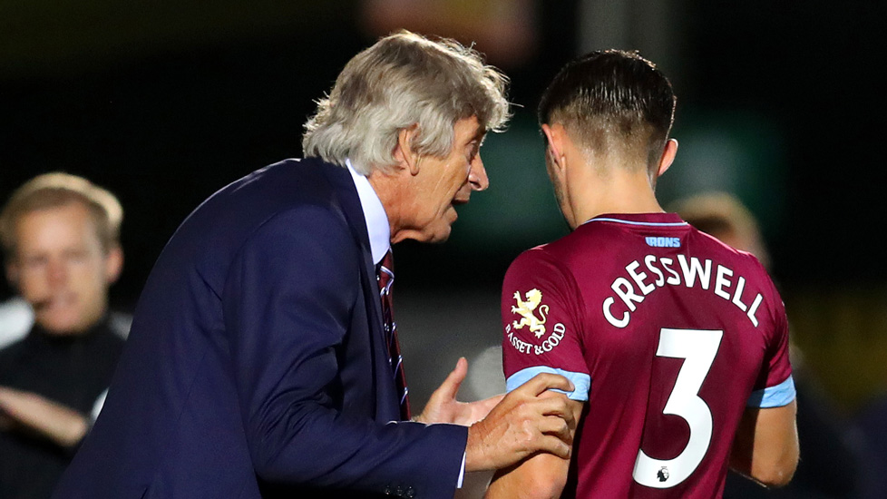 Manuel Pellegrini gives Aaron Cresswell some instructions