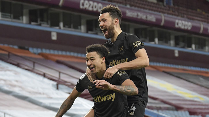 Ryan Fredericks celebrates with Jesse Lingard