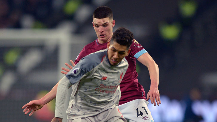 Declan Rice keeps tabs on Liverpool's Roberto Firmino