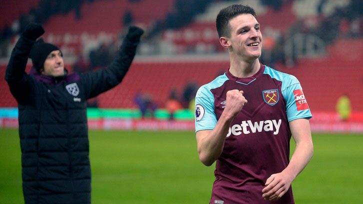 The 19-year-old celebrates victory at Wembley alongside fellow Academy graduate Mark Noble