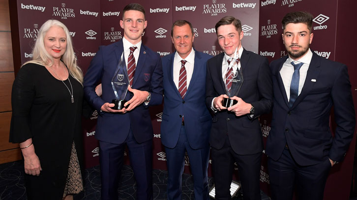 Declan Rice, Conor Coventry celebrate their awards with the Tombides family