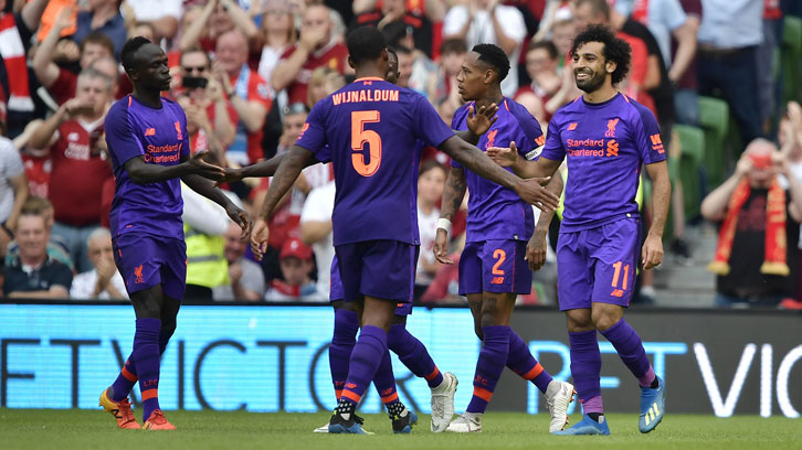 Mo Salah and his Liverpool teammates celebrate a goal