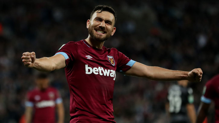 Robert Snodgrass celebrates scoring against Macclesfield Town