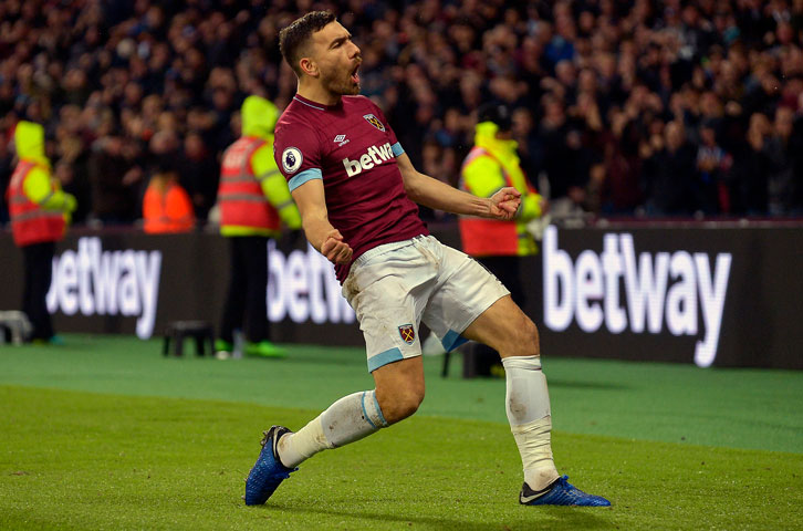 Robert Snodgrass celebrates scoring against Crystal Palace at London Stadium