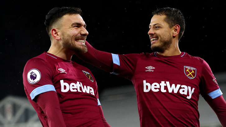 Robert Snodgrass and Chicharito celebrate at Fulham