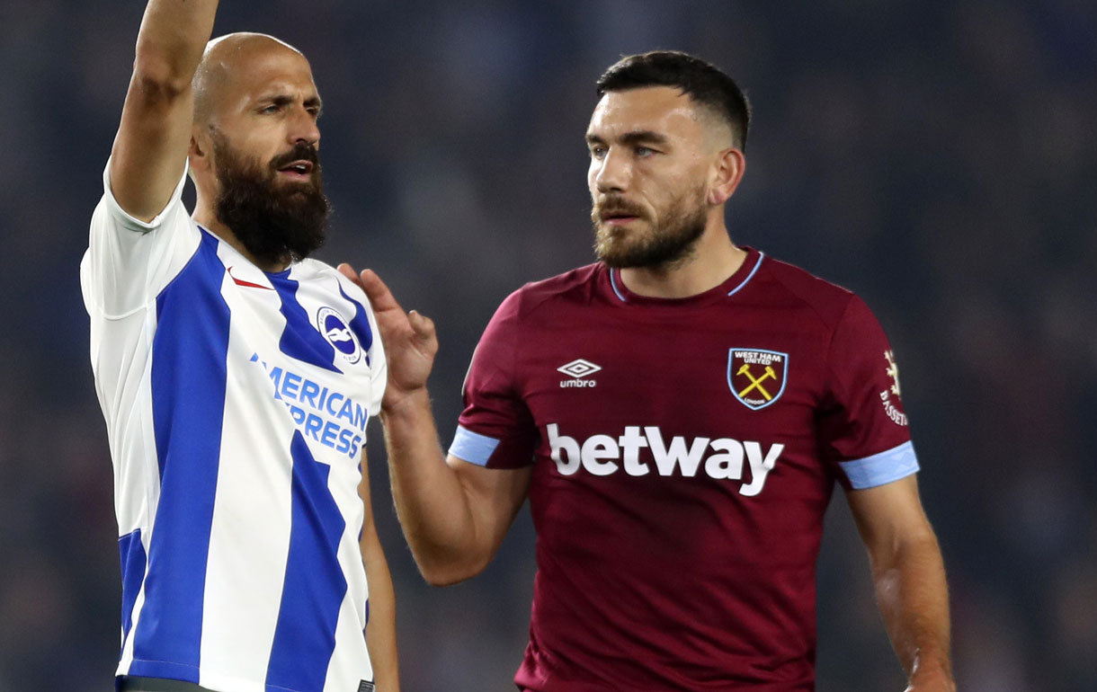 Robert Snodgrass with Brighton's Bruno