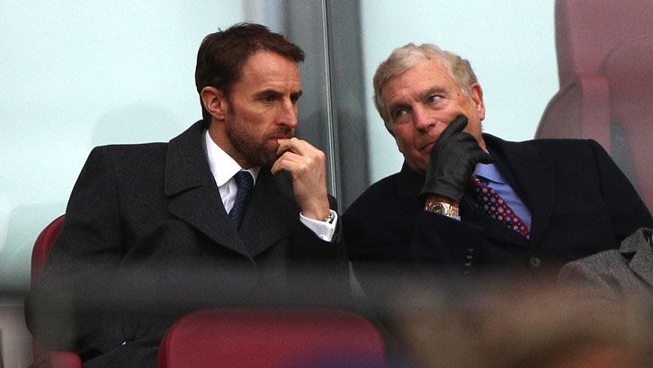 Gareth Southgate chats to Sir Trevor Brooking at London Stadium
