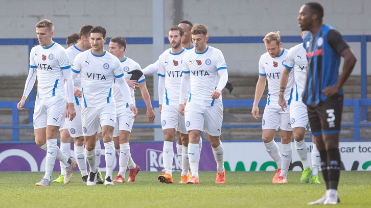 Stockport County celebrate scoring in their first-round win over Rochdale