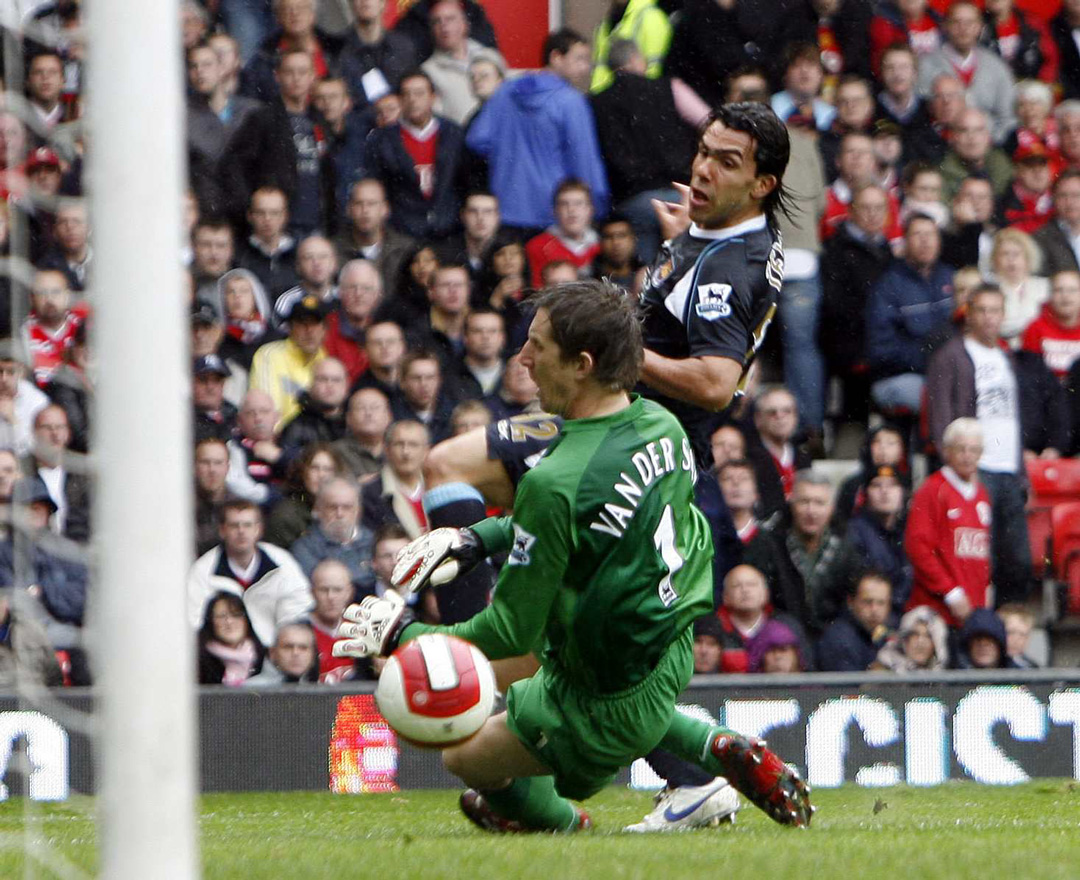 Carlos Tevez scores at Old Trafford to complete the Great Escape