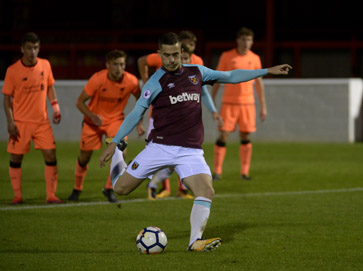 Martinez takes aim from the penalty spot