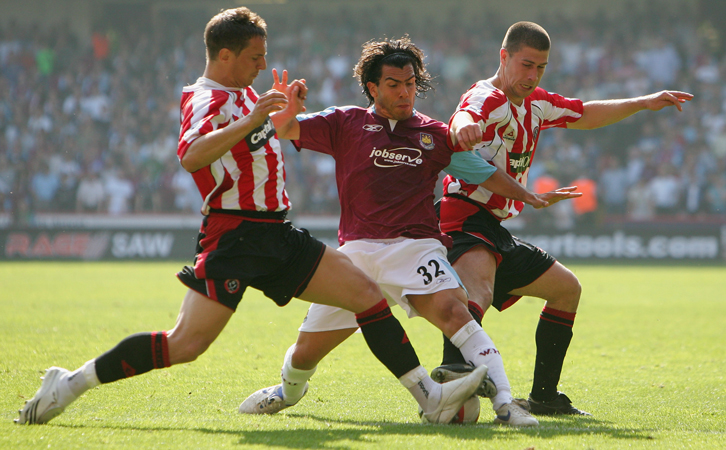 Carlos Tevez in action against Sheffield United