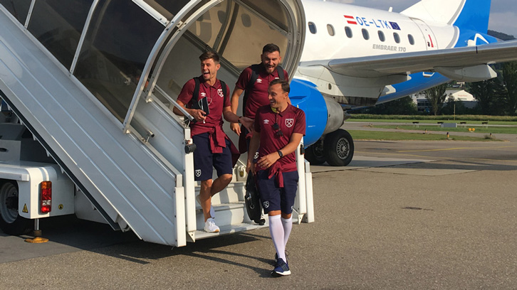 Mark Noble, Aaron Cresswell and Robert Snodgrass are all smiles as they arrive in Switzerland