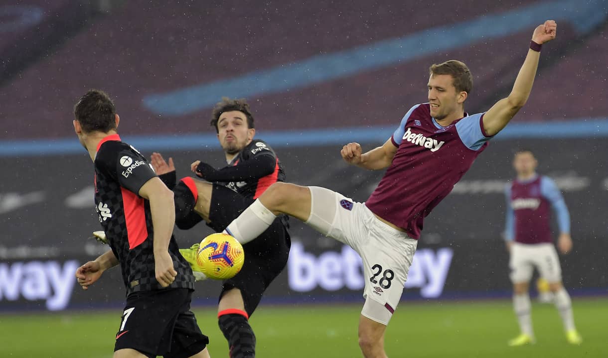 Tomas Soucek in action against Liverpool