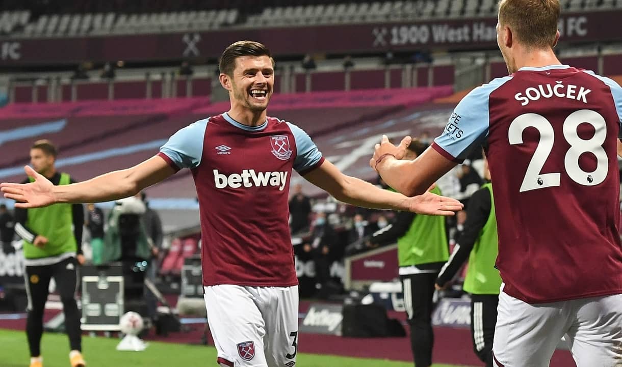 Aaron Cresswell celebrates with Tomas Soucek