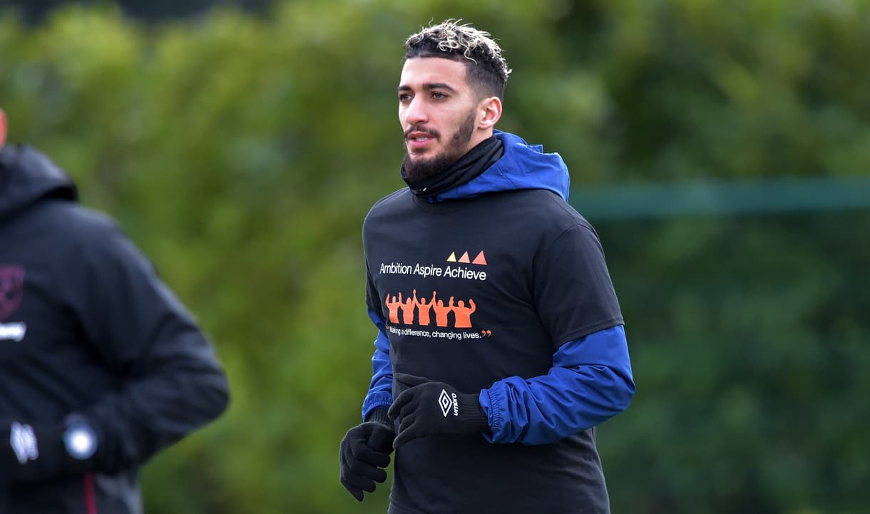 The first team squad trained in Ambition Aspire Achieve T-Shirts ahead of Sunday's game against Tottenham Hotspur