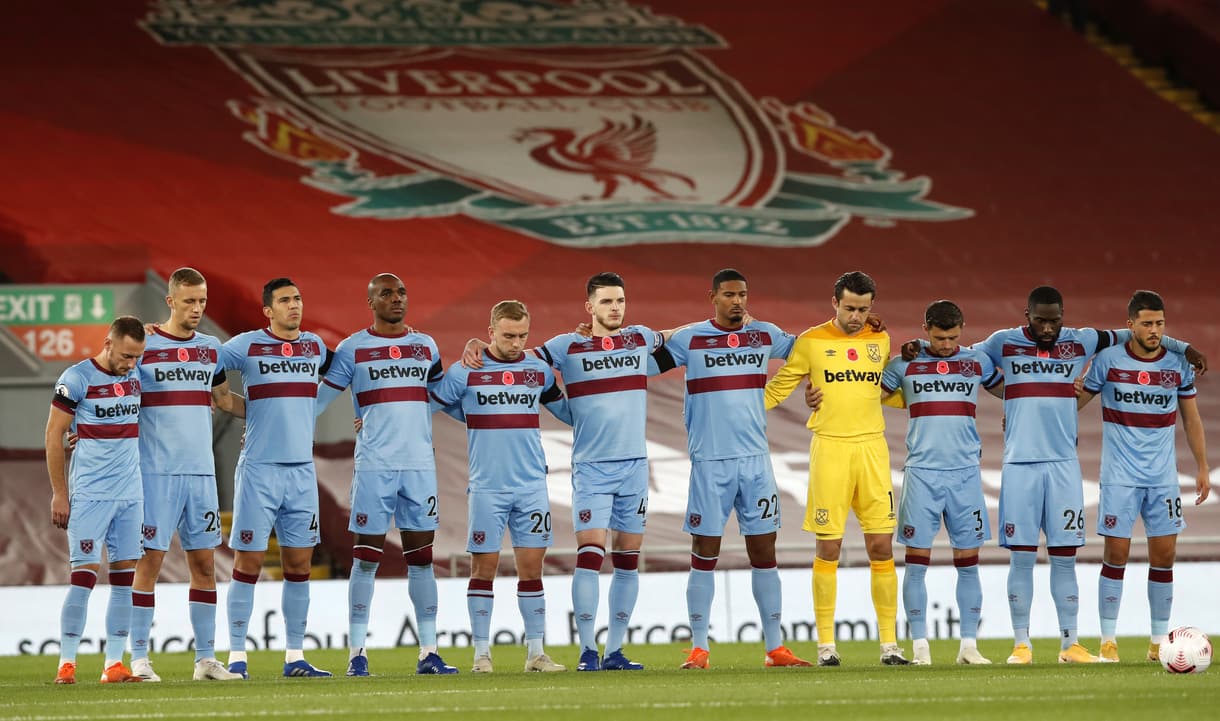 West Ham observe a minute's silence at Anfield