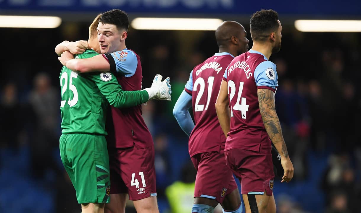 The Hammers congratulate David Martin at full time against Chelsea