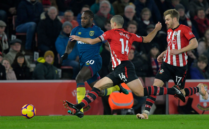 Michail Antonio drives with the ball against Southampton