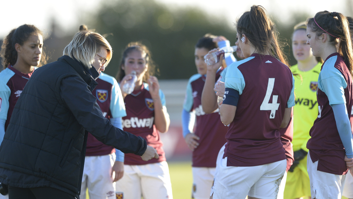 Karen Ray talks with the West Ham Ladies players during the 0-0 with Gillingham