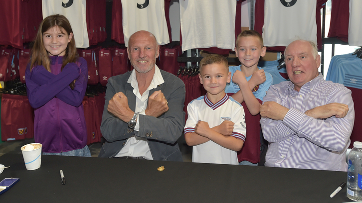 Alvin and Alan pose with three young West Ham fans