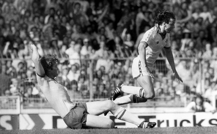 Willy Young brings down Paul Allen in the closing minutes of the 1980 FA Cup final
