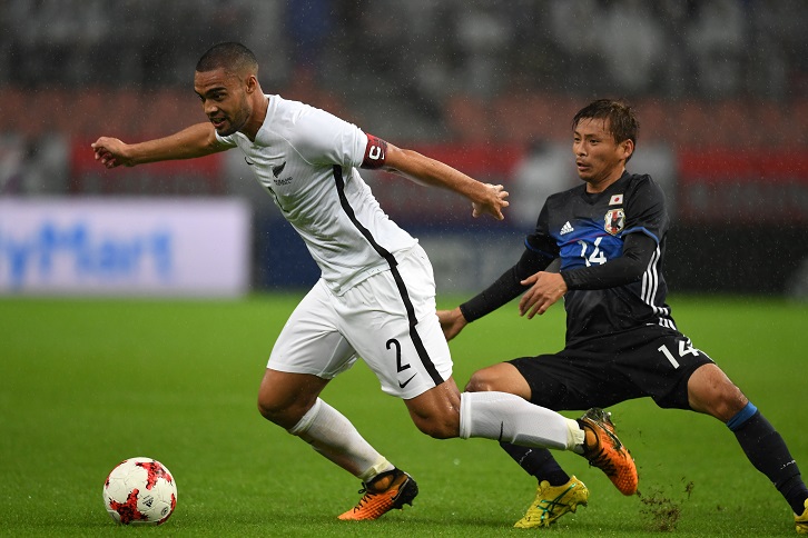 Winston Reid in action for New Zealand in Japan this week