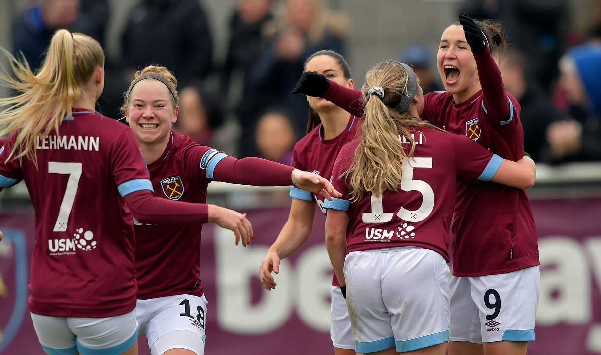 The women's team celebrate