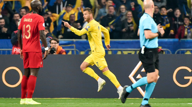 Andriy Yarmolenko celebrates scoring for Ukraine