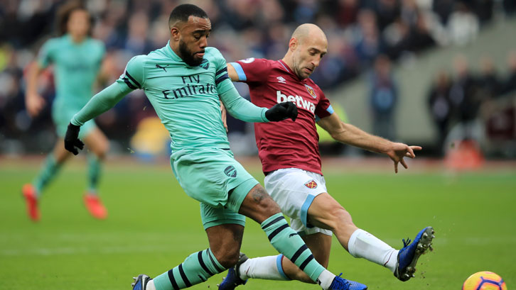 Pablo Zabaleta challenges Alexandre Lacazette