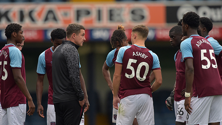 Halajko speaks to the players in the Papa John's Trophy