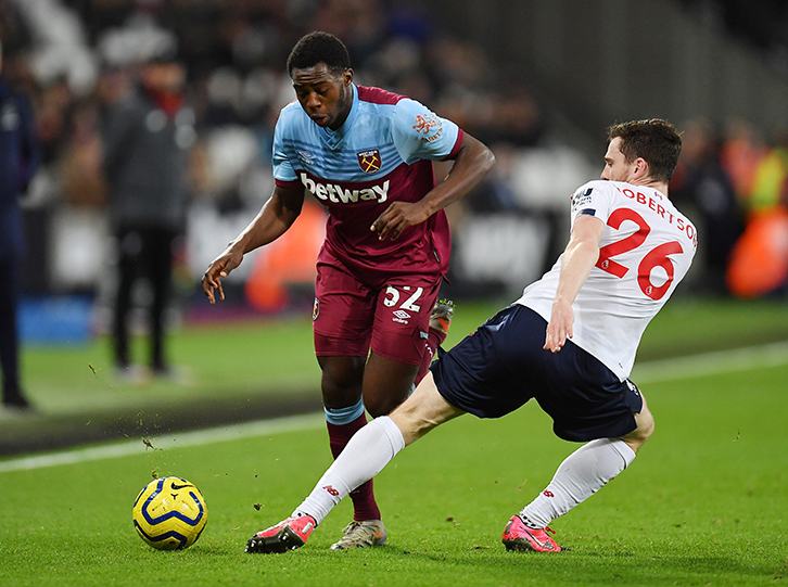 West Ham United's Jeremy Ngakia takes on Liverpool's Andy Robertson