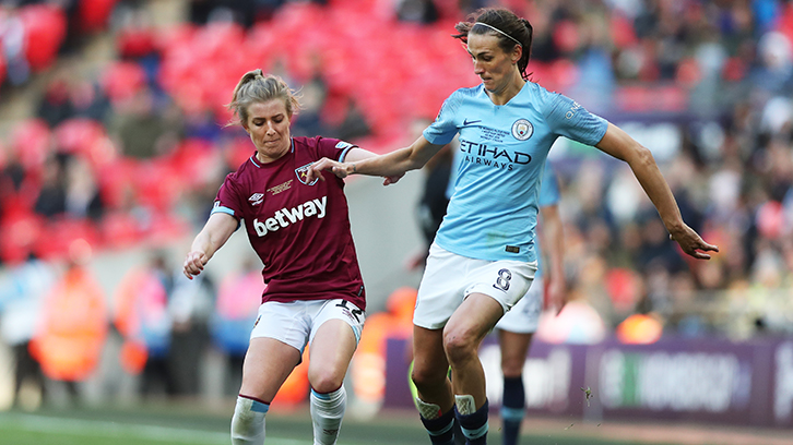 West Ham United's Kate Longhurst vies for the ball against Manchester City
