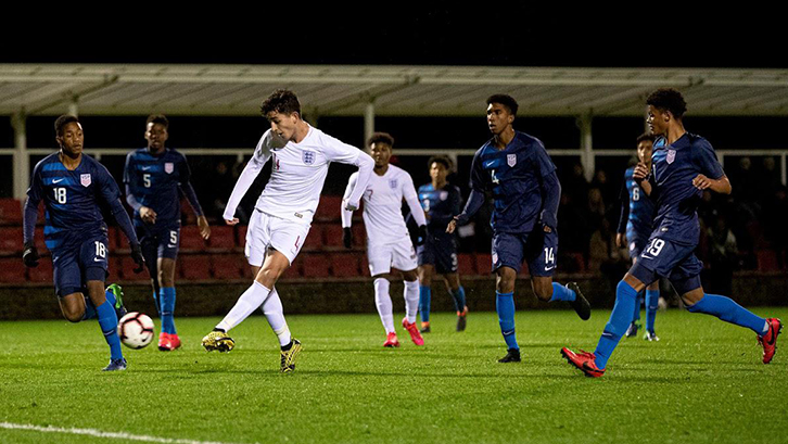 Sonny Perkins scores against USA