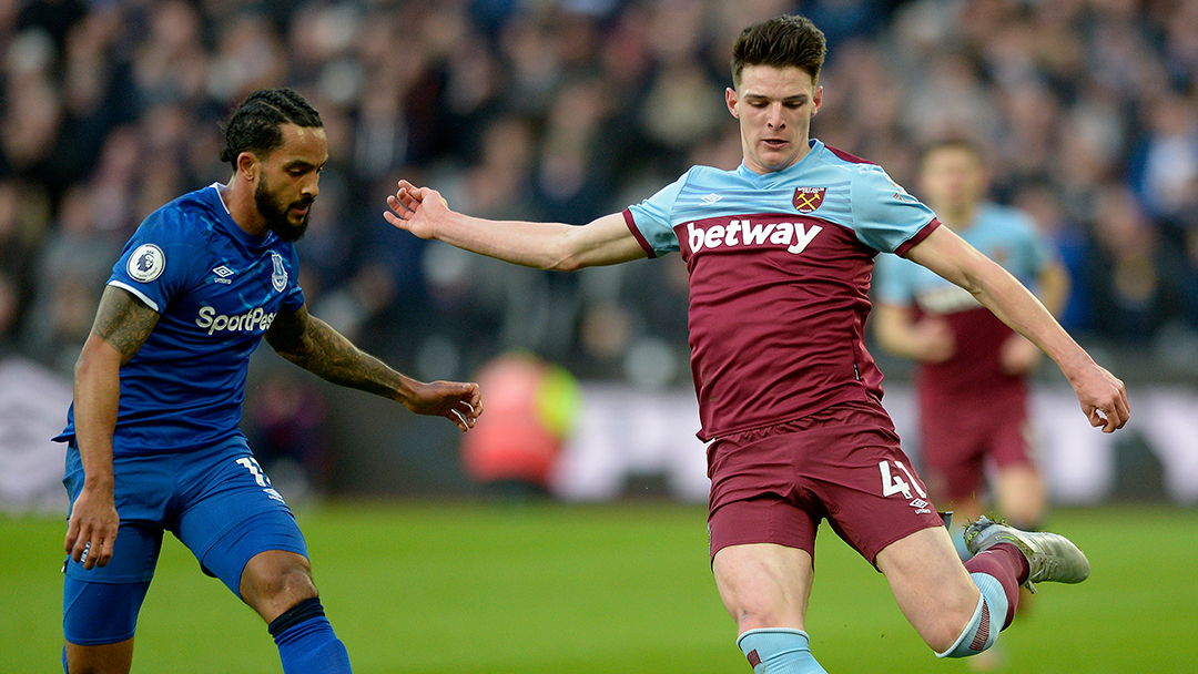 Theo Walcott and West Ham United's Declan Rice