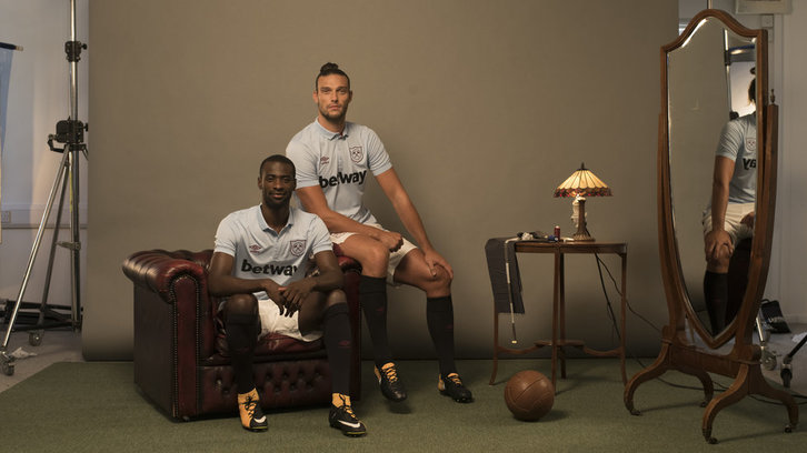 Andy Carroll and Pedro Obiang pose in the new West Ham United third kit