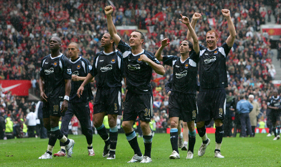 The Hammers celebrate securing safety at Old Trafford