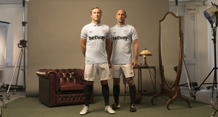 Mark Noble and Pablo Zabaleta pose in the new West Ham united third kit