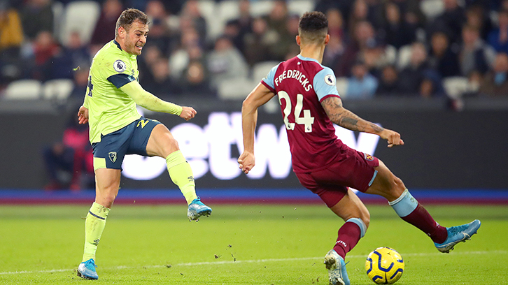 West Ham United's Ryan Fredericks blocks a shot by Ryan Fraser