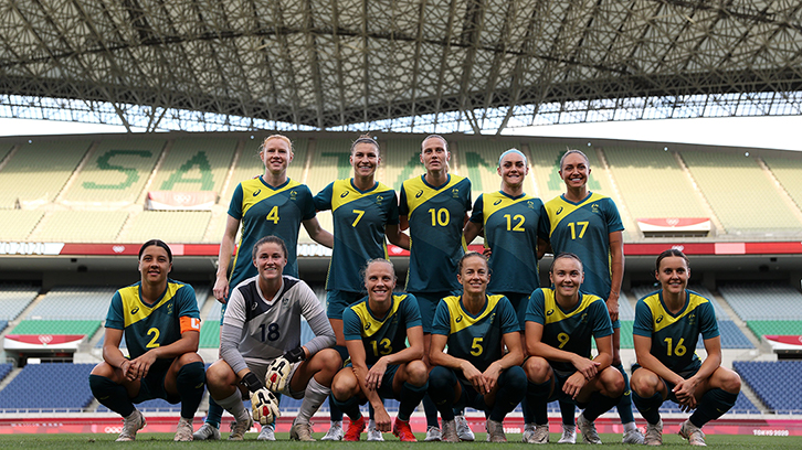 Tameka Yallop (No13) and her Australia teammates in Saitama